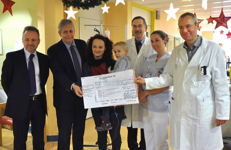 On behalf of MWM Thoralf Lemke and Willy Schumacher hand over the check On behalf of MWM Thoralf Lemke and Willy Schumacher hand over the check