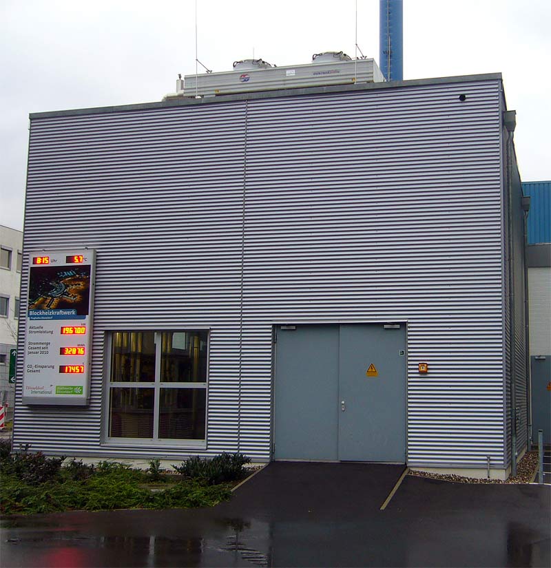 CHP plant in Heating Plant III at Düsseldorf International Airport, front of building with pub