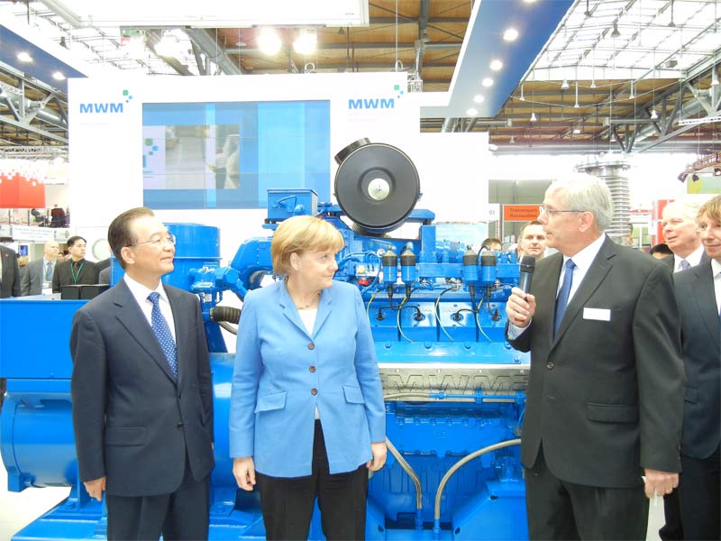 Angela Merkel und der chinesische Ministerpräsident Wen Jiabao mit Willy Schumacher (Vorsitzender der Geschäftsführung M