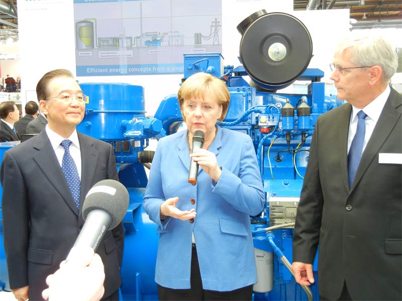 Angela Merkel und der chinesische Ministerpräsident Wen Jiabao mit Willy Schumacher