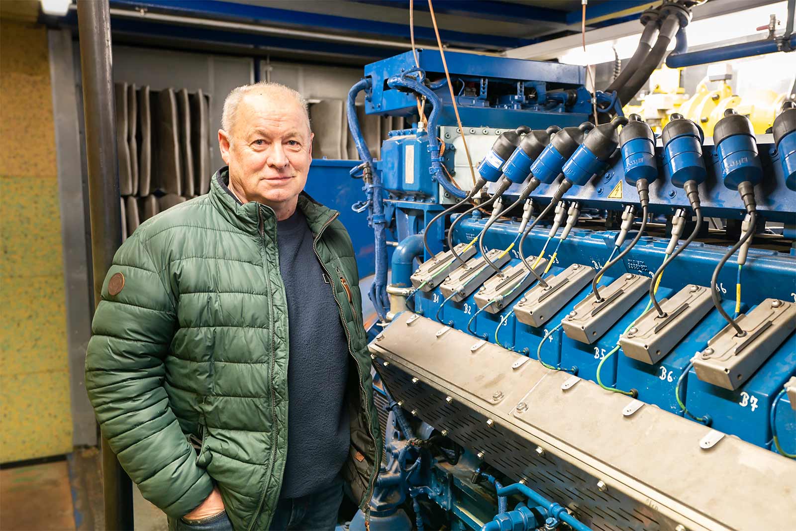 Hans Michael Keck, Managing Director of BG Biogas Service GmbH, in front of the newly installed gas engine