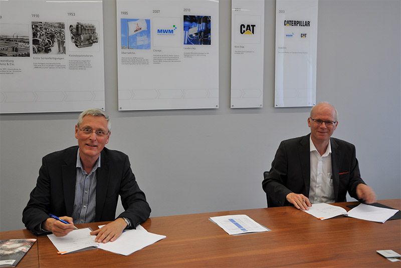 Uwe Sternstein, Leiter Service und Geschäftsführer von Caterpillar Energy Solutions, und Frank Ganssloser, CEO des Tübin