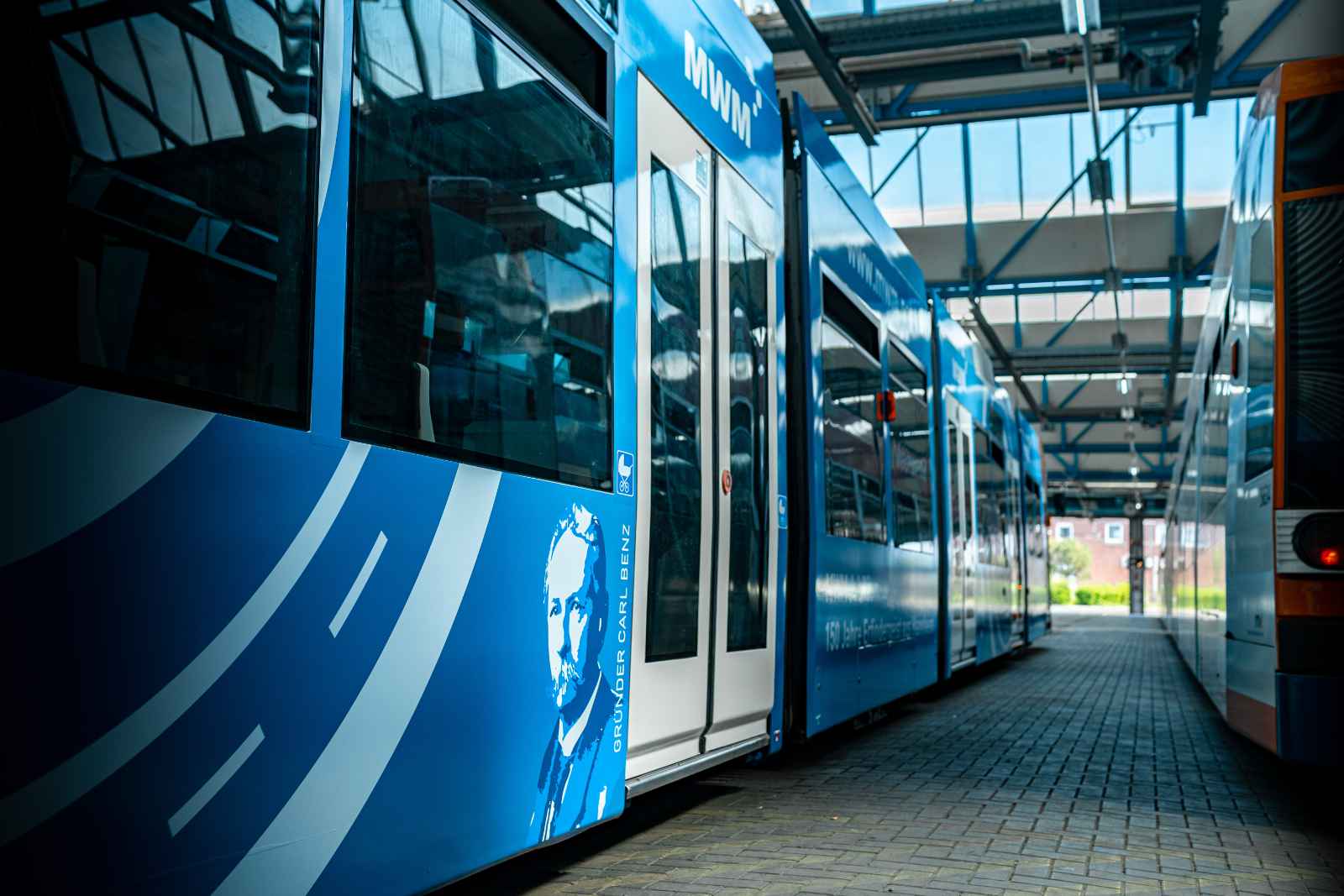 Tram in blue MWM design in Mannheim